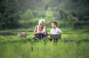 grandmother and child with laptop