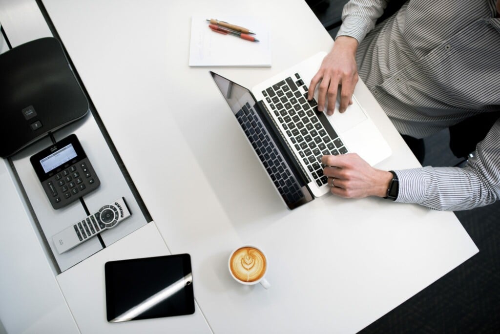 stock image showing a man with a laptop for an article about the evolution of fintech in Latin America