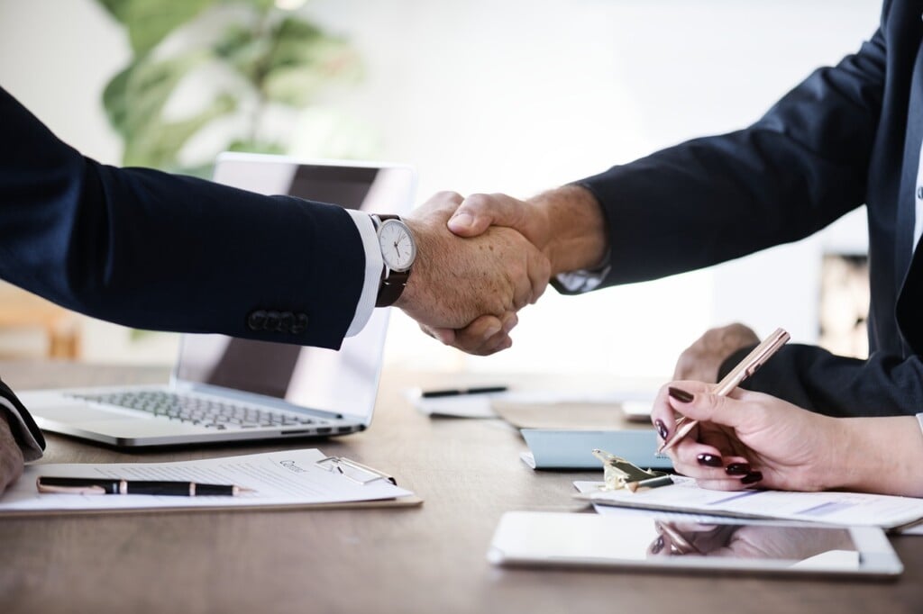 Two businesspeople shaking hands