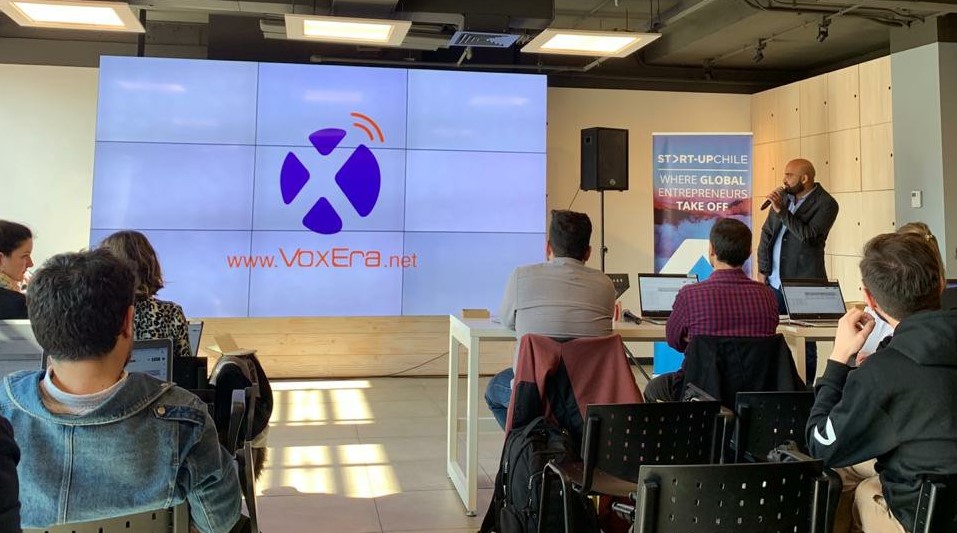 Amr Elghandour delivering a presentation about VoxEra