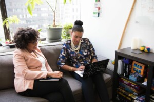 Two women talking together