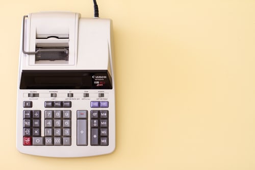 A photo of a calculator representing tax filing in Ecuador