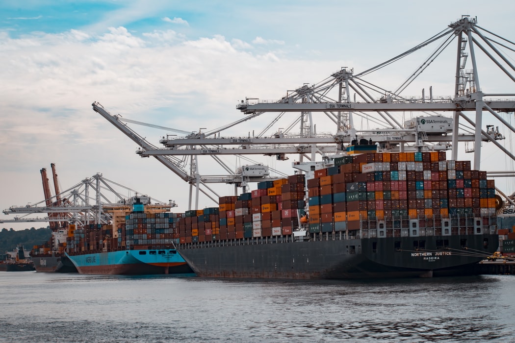 Freight containers on a ship, representing Brazilian agriculture exports rising in May 2021