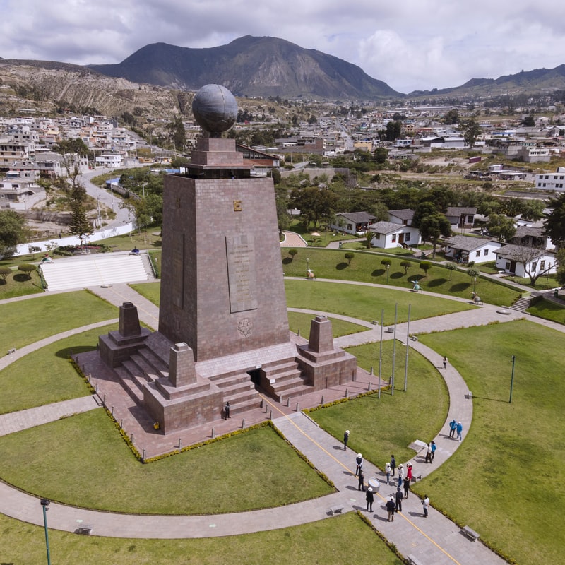 A photo of Ciudad Mitad del Mundo, a monument marking where the equator stands north of the capital, Quito. You may wish to fnid a trademark attorney in Ecuador.
