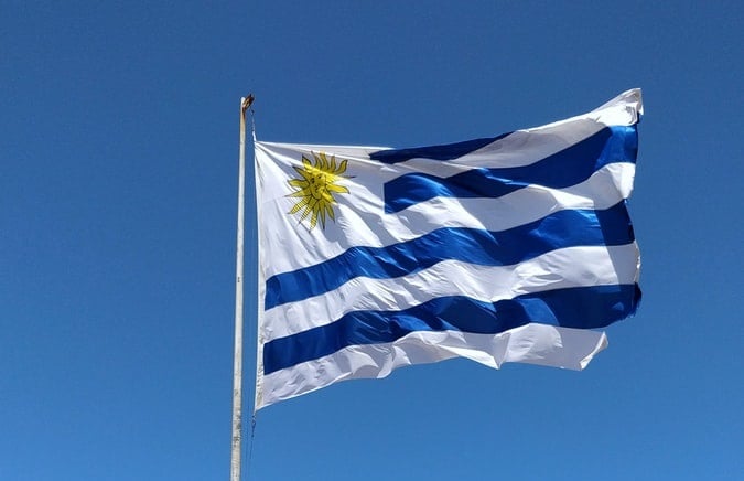 The flag of Uruguay, where you can streamline your business by outsourcing back office services
