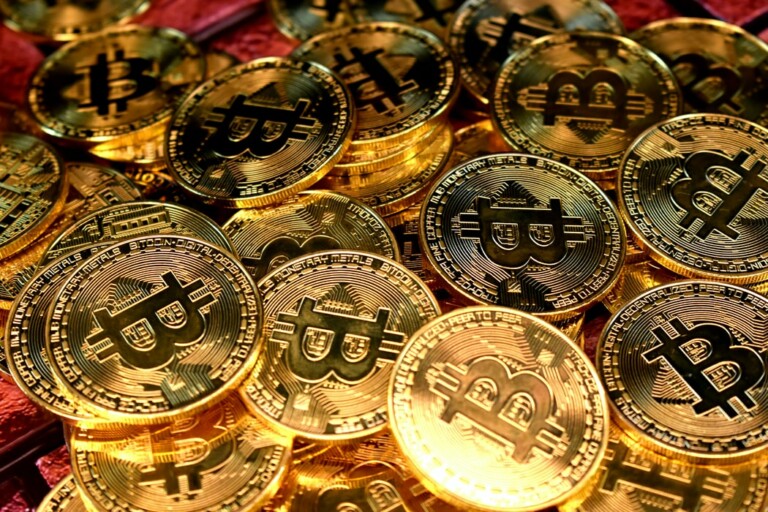 A photo depicting physical Bitcoins to accompany an article on the adoption as legal tender of Bitcoin in El Salvador