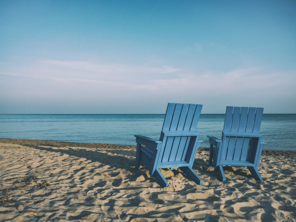 A stock photo of chairs on a beach for article on where to retire in latin america