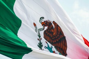 Stock image of Mexican flag to accompany article on financial regulatory compliance in Mexico