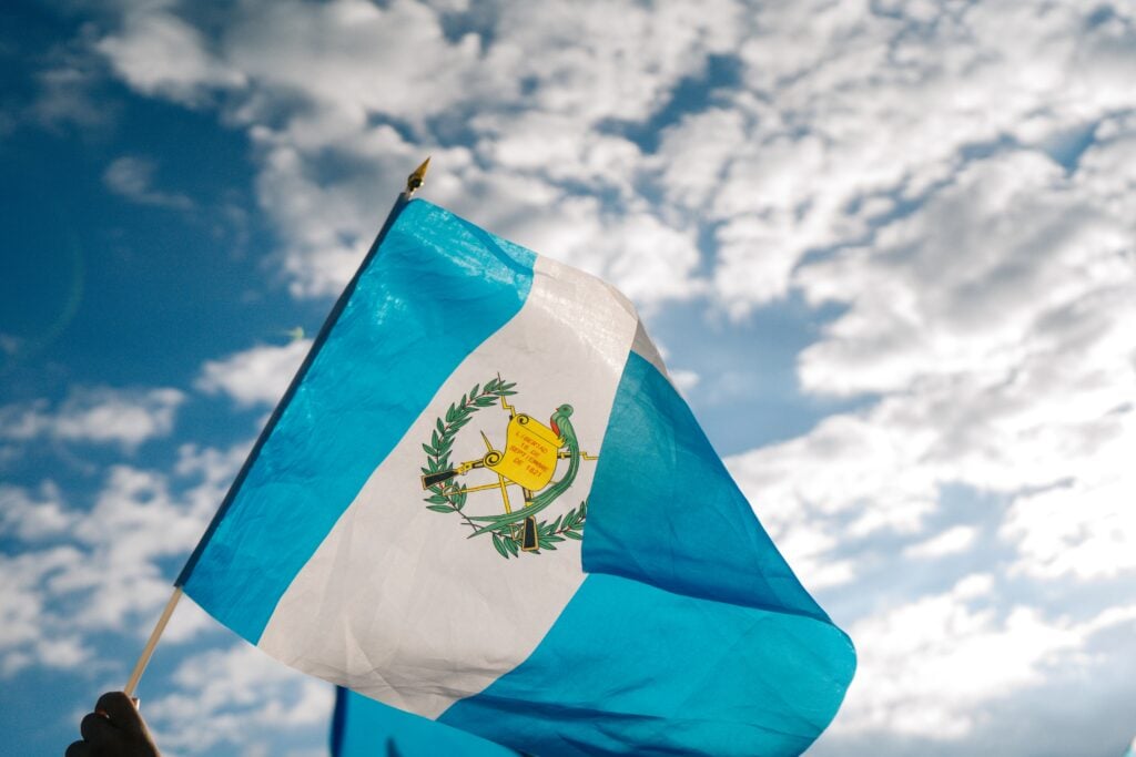 Stock image of Guatemalan flag to accompany article on foreign investment in Guatemala