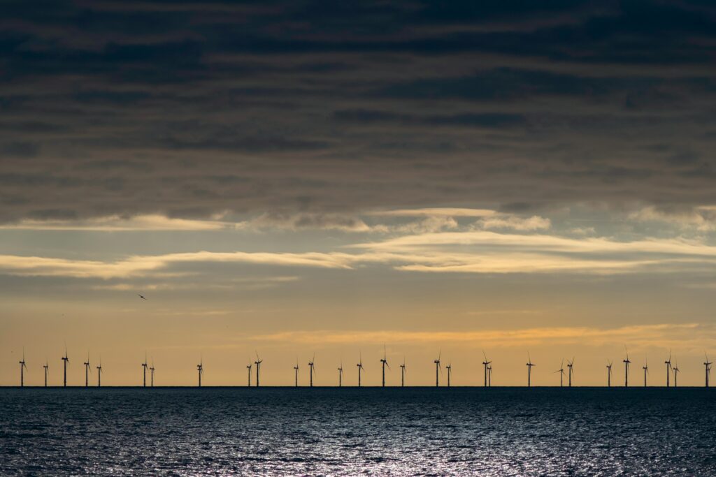 A stock image of a wind farm at sea to accopany article on renewable energy in Latin America