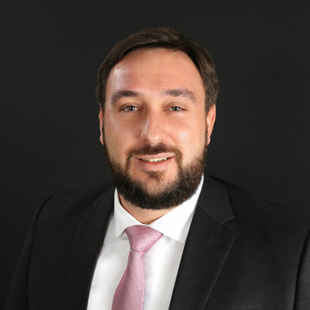 A photo of Luigi Wewege, president of Caye International Bank